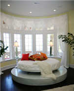 Super size round bed suite